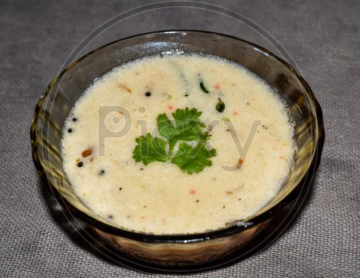 South Indian Cuisine - White Coconut Chutney Served In A Glass Bowl.Selective Focus Applied.