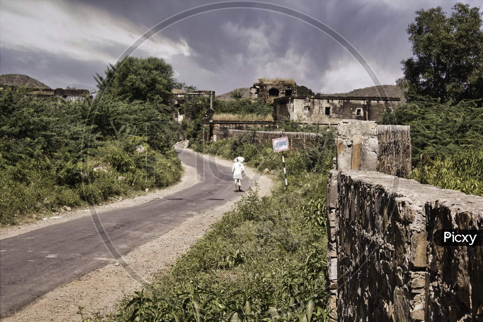 Rajasthan, India - October 06, 2012: A Landscape Surrounding Abandoned Cursed Fort In A Place Named Ajabgarh On A Way To Allegedly Haunted Place Bhangarh Fort