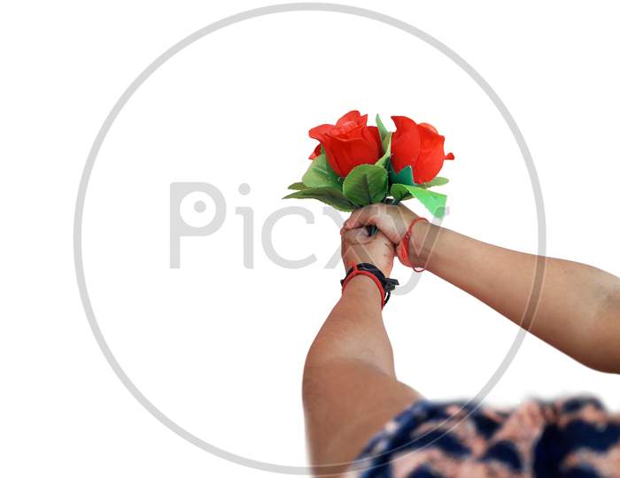 Little Girl Giving Roses Bouquet To Someone Isolated Photo