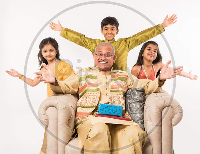 Indian kids and grandparents celebrating festival