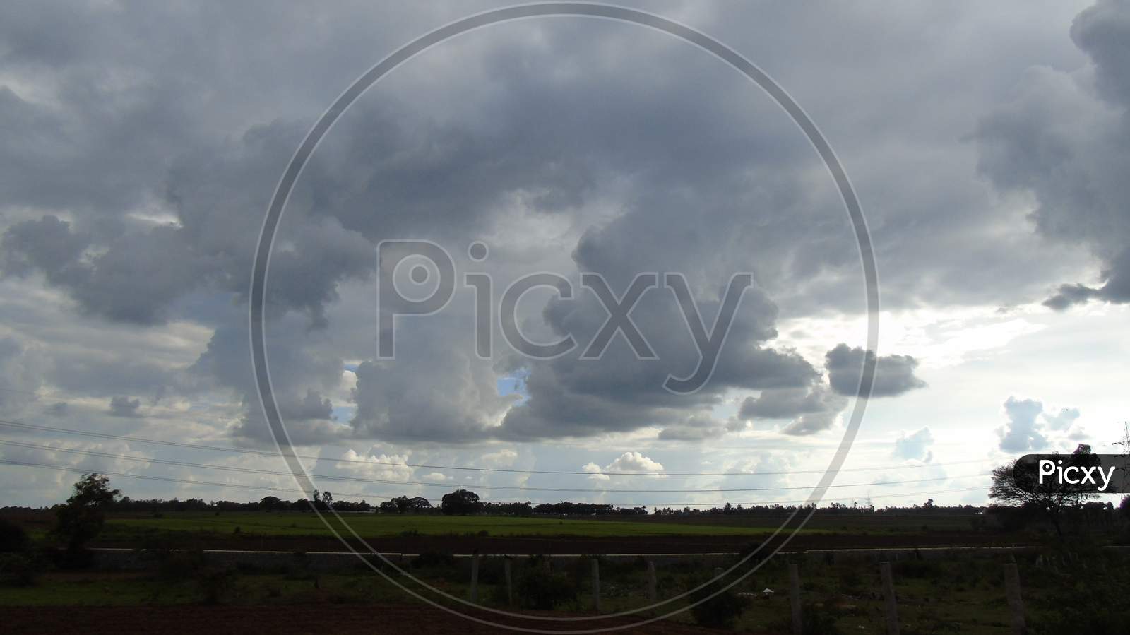 cloudy sky above the  field