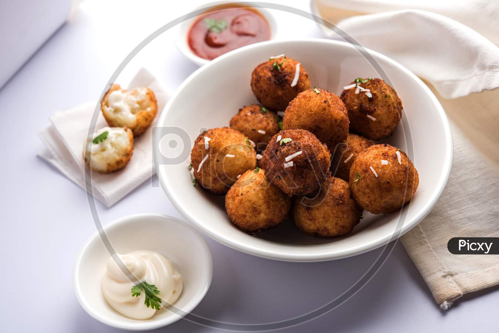 Fried potato cheese balls or croquettes