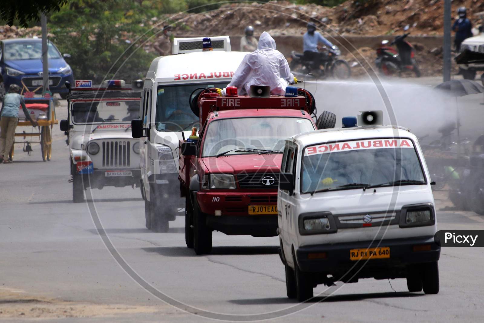 Health workers carry the dead body a person who died of coronavirus infection for cremation in an ambulance in Ajmer, Rajasthan on July 08, 2020