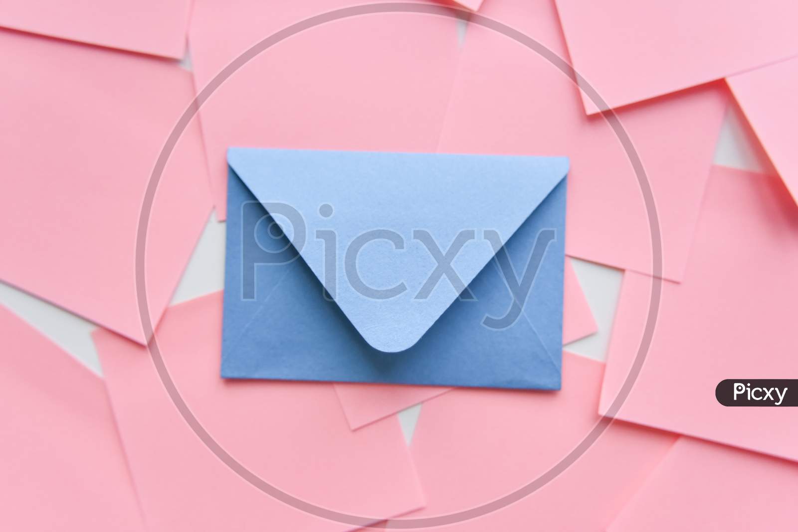 Selective Focus, Blue Envelope On The Background Of Coral Stickers
