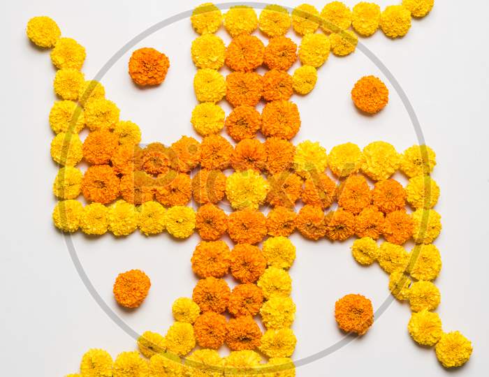 Swastika made using Marigold flowers for Diwali or Ponga