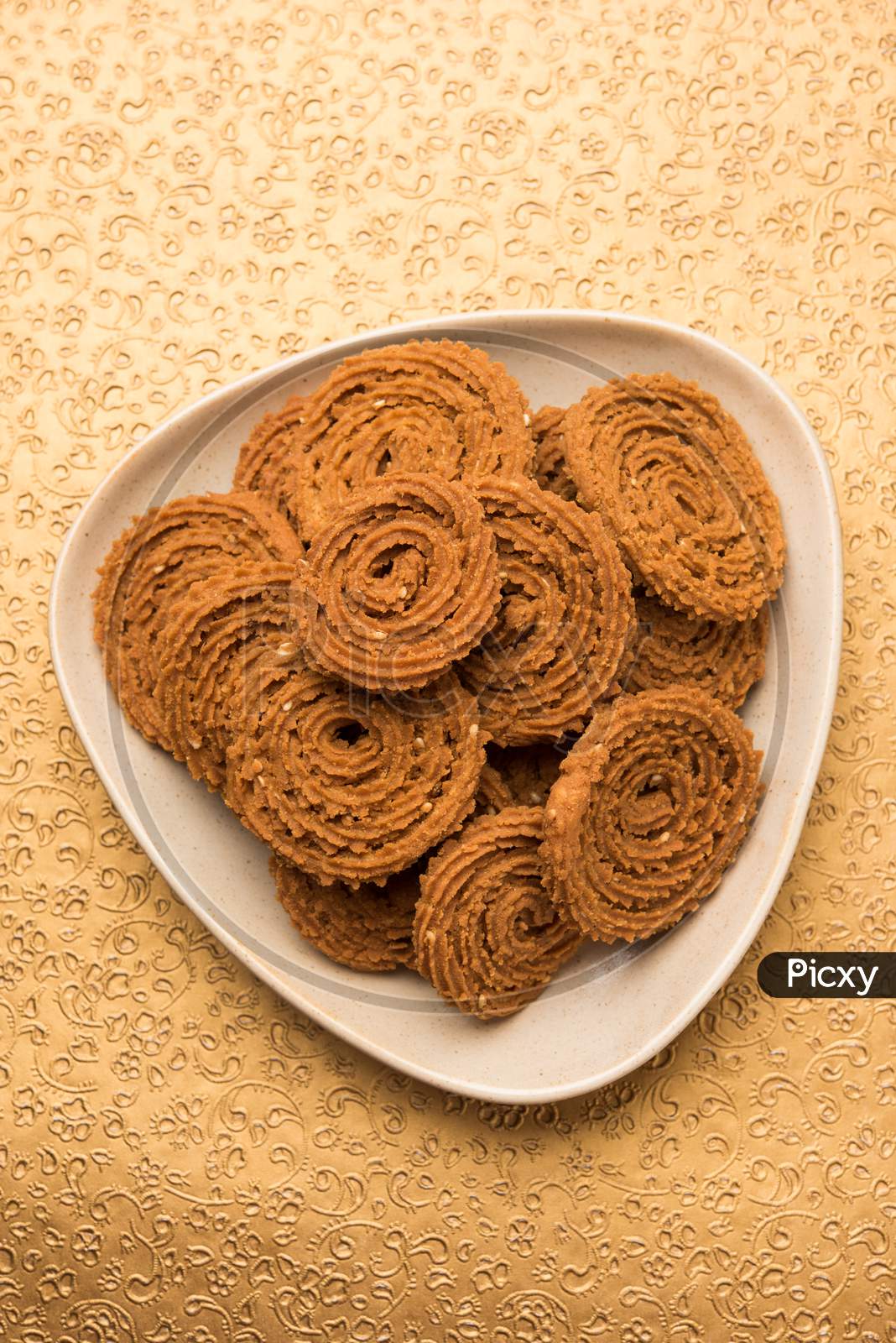 Chakli or Chakali or Murukku, popular salty food made during diwali festival in India