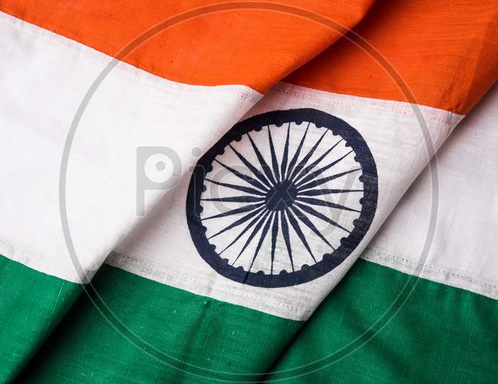 Indian flag with folds over table