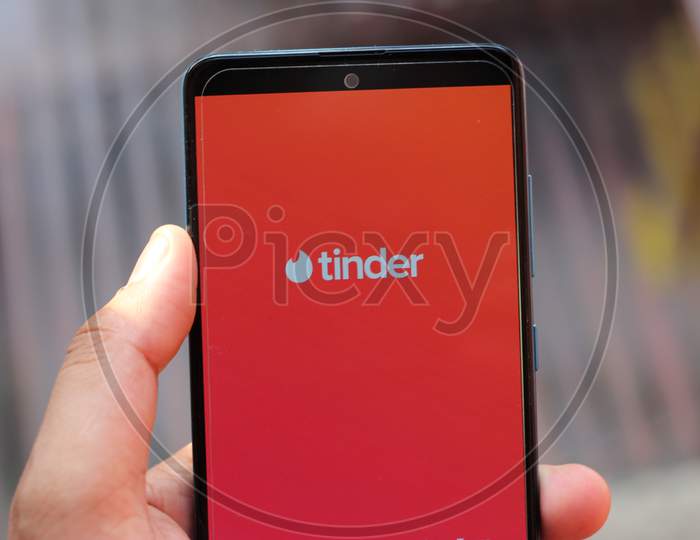 Tinder Dating application on smartphone.