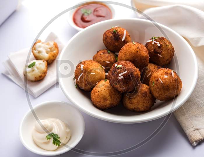 Fried potato cheese balls or croquettes