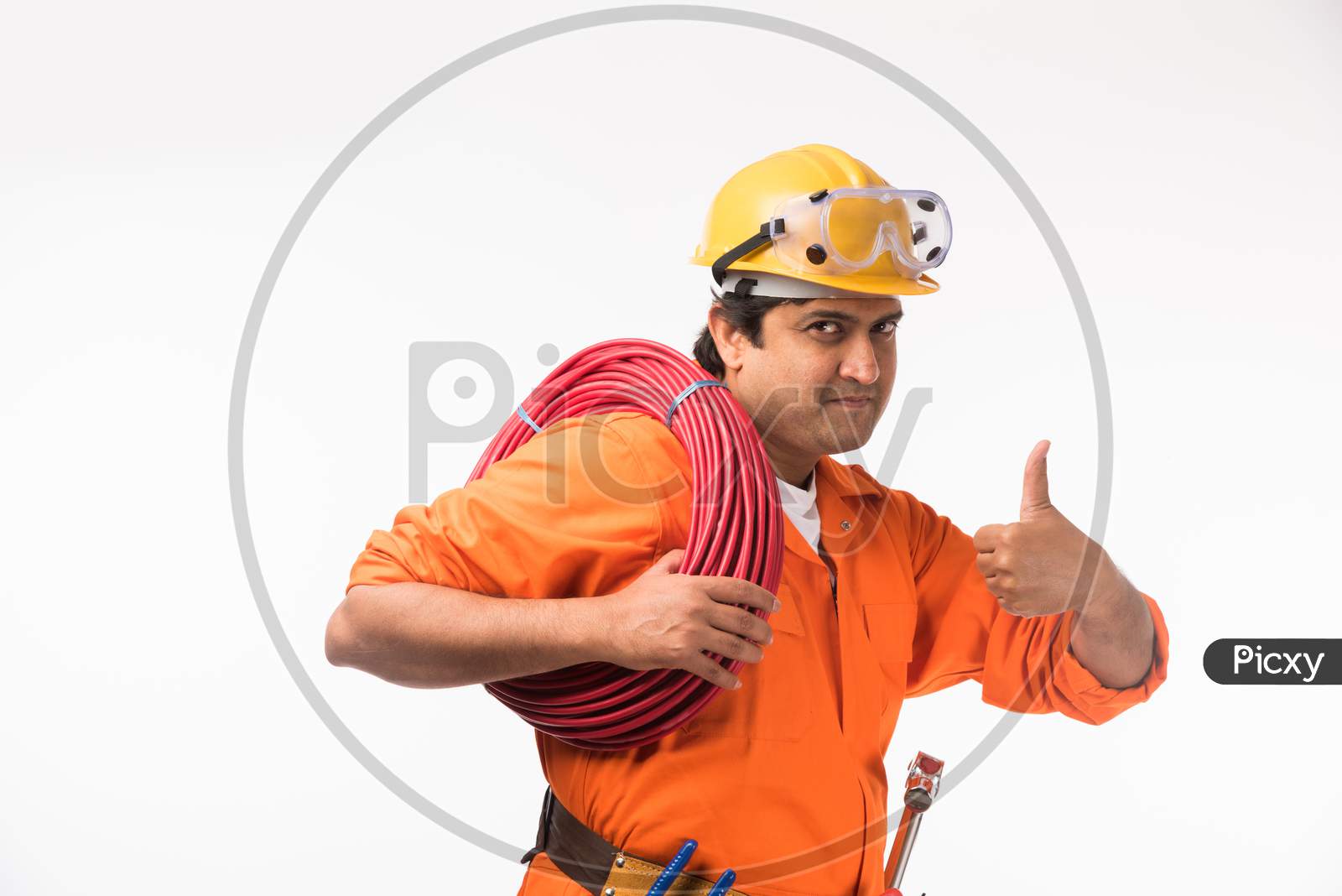 Indian/Asian electrician or electrical engineer in action