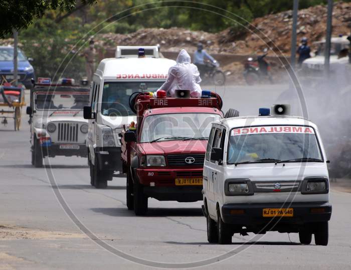 Health workers carry the dead body a person who died of coronavirus infection for cremation in an ambulance in Ajmer, Rajasthan on July 08, 2020