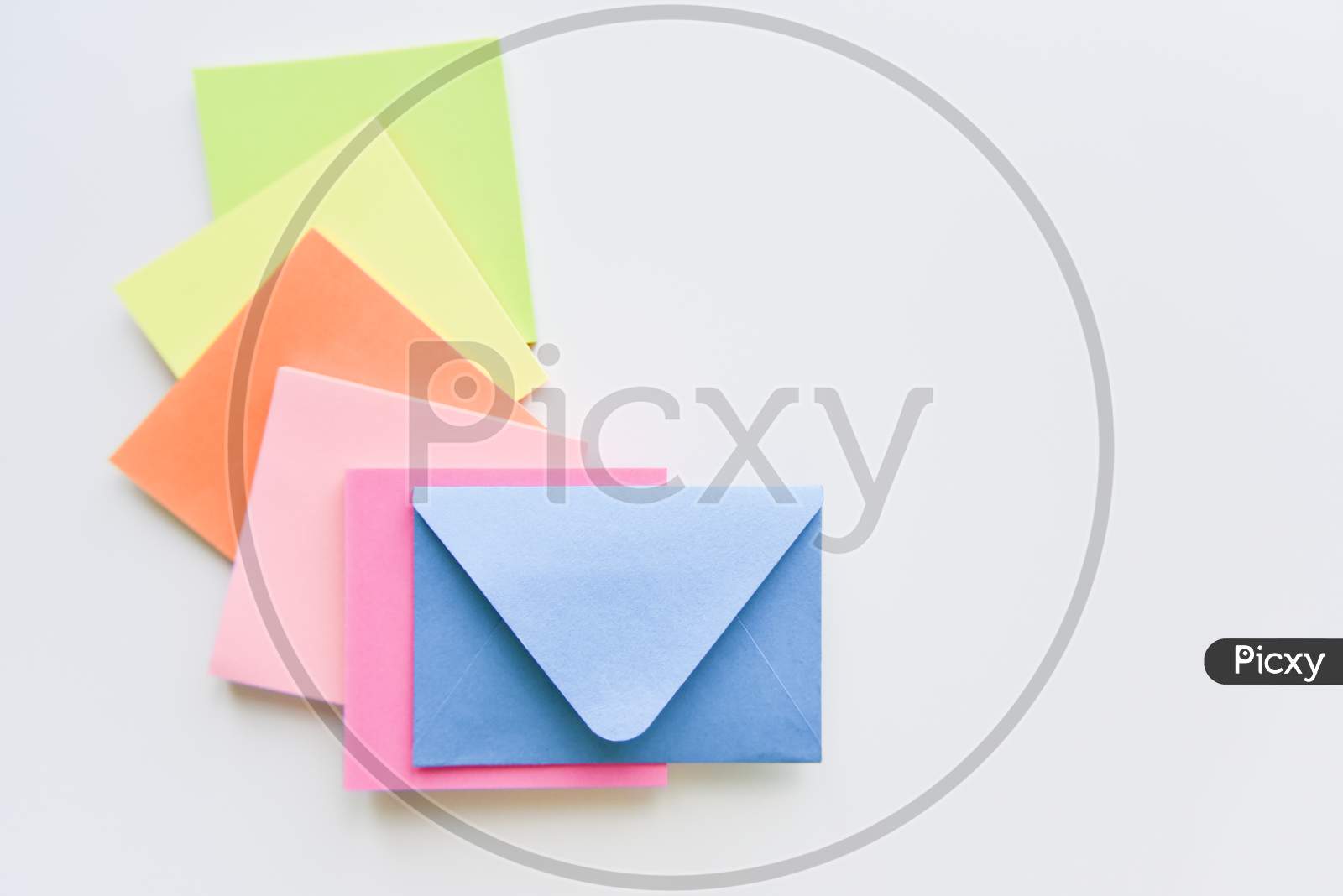 Selective Focus, Blue Envelope In The Center With Colored Rectangles Spreading Under It