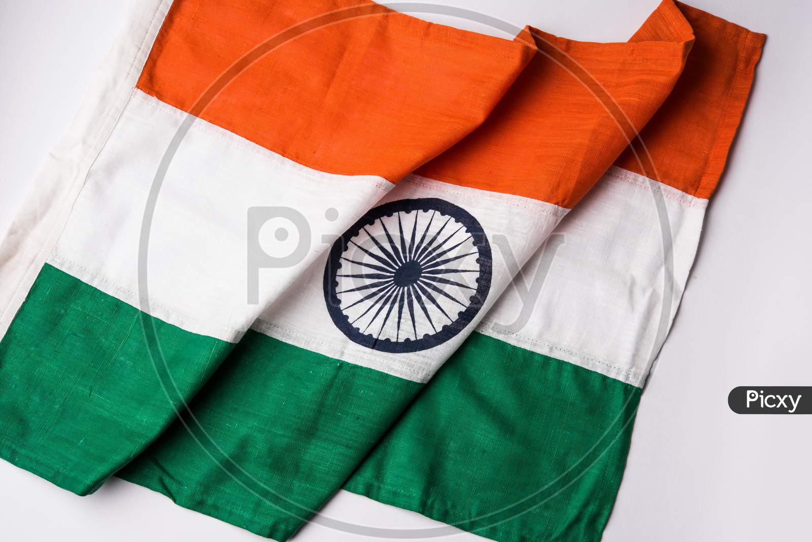 Indian flag with folds over table
