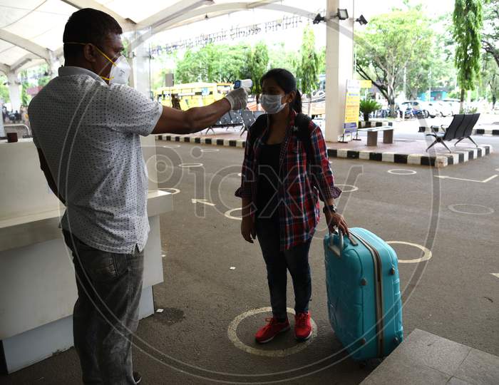 A Passenger Gets Thermal Scanned Arrives At Lokpriya Gopinath Bordoloi International Airport, Following The Resumption Of Domestic Flights, In Guwahati,Assam,India, Monday, May 25, 2020.