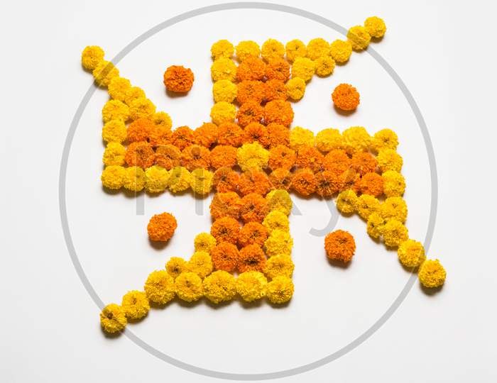 Swastika made using Marigold flowers for Diwali or Ponga