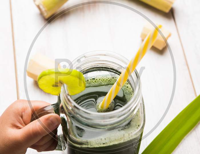 Sugarcane Juice OR Ganne Ka Ras in a glass or Jar