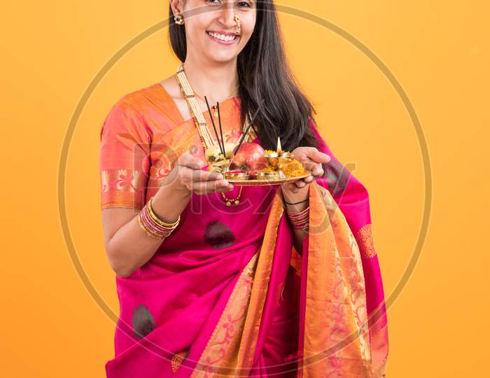 Indian lady with puja thali