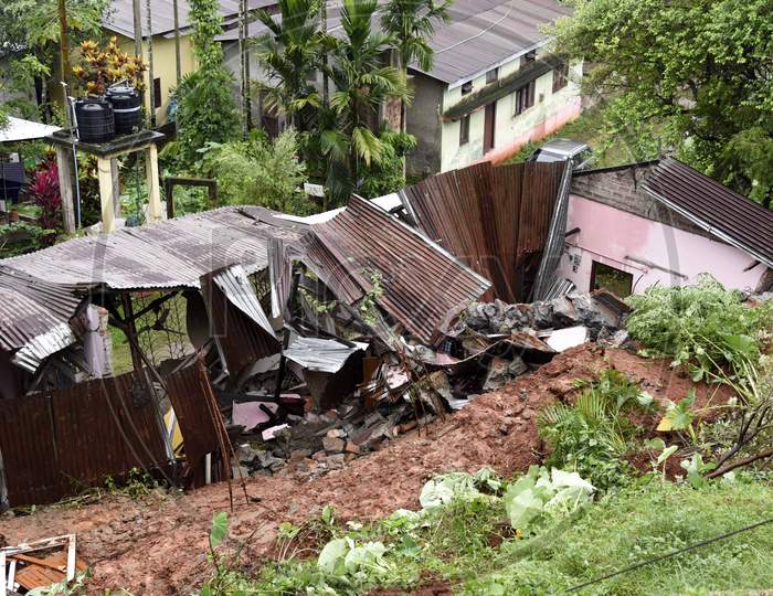 Debris piles after a landslide due to incessant rain