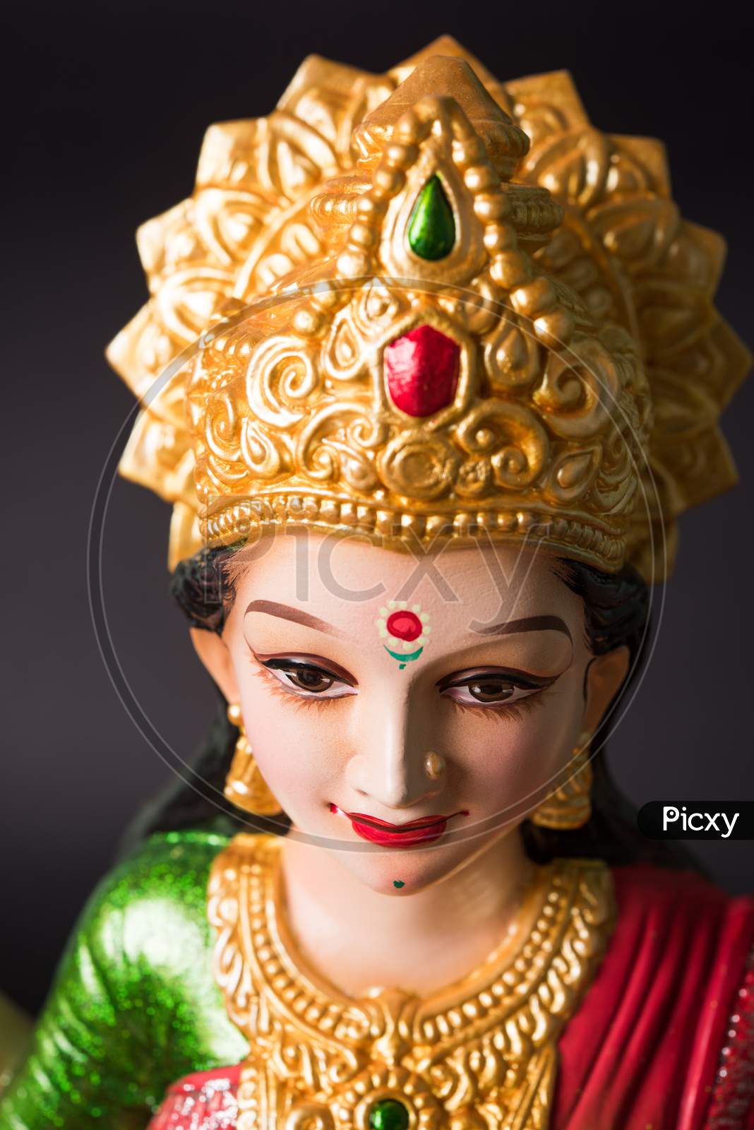 Beautiful Clay Idol of Hindu Goddess Lakshmi OR Laxmi, selective focus