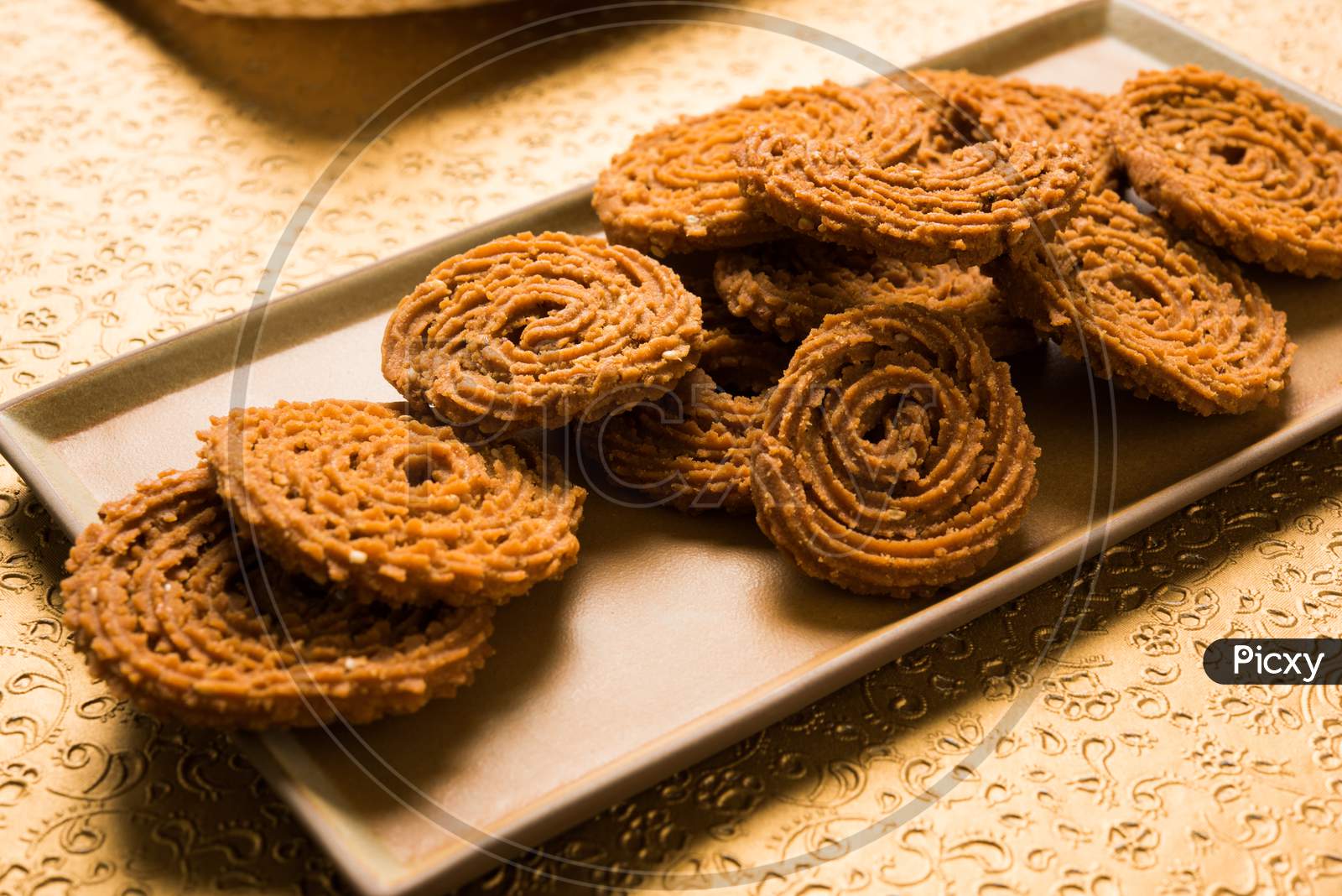 Chakli or Chakali or Murukku, popular salty food made during diwali festival in India