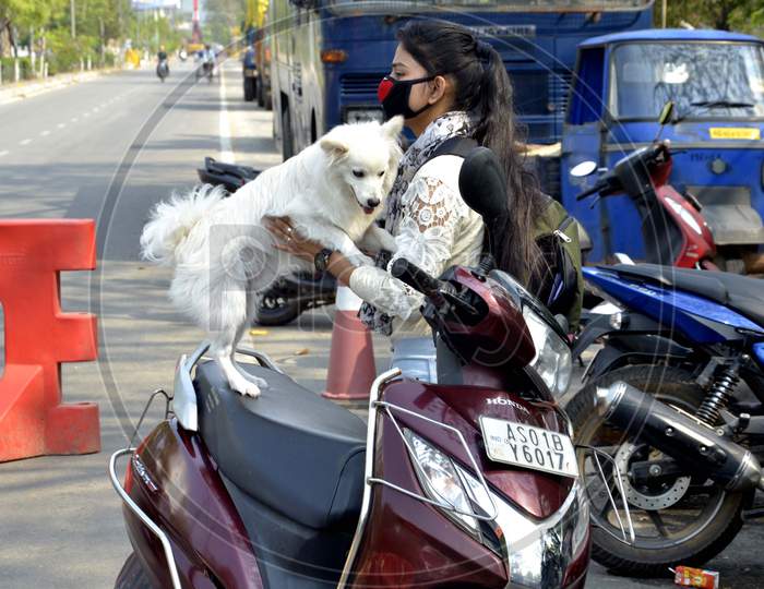 A Girl seen with her puppy