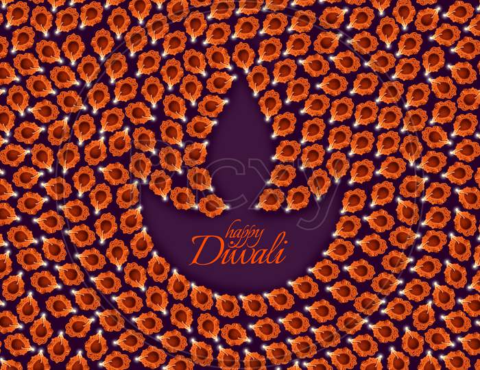 Happy Diwali Greeting card using  Diwali diya shape created using many Diyas