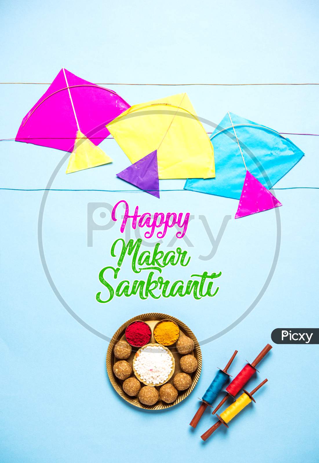 Happy Makar Sankranti - tilgul, patang or kite with haldi kumkum