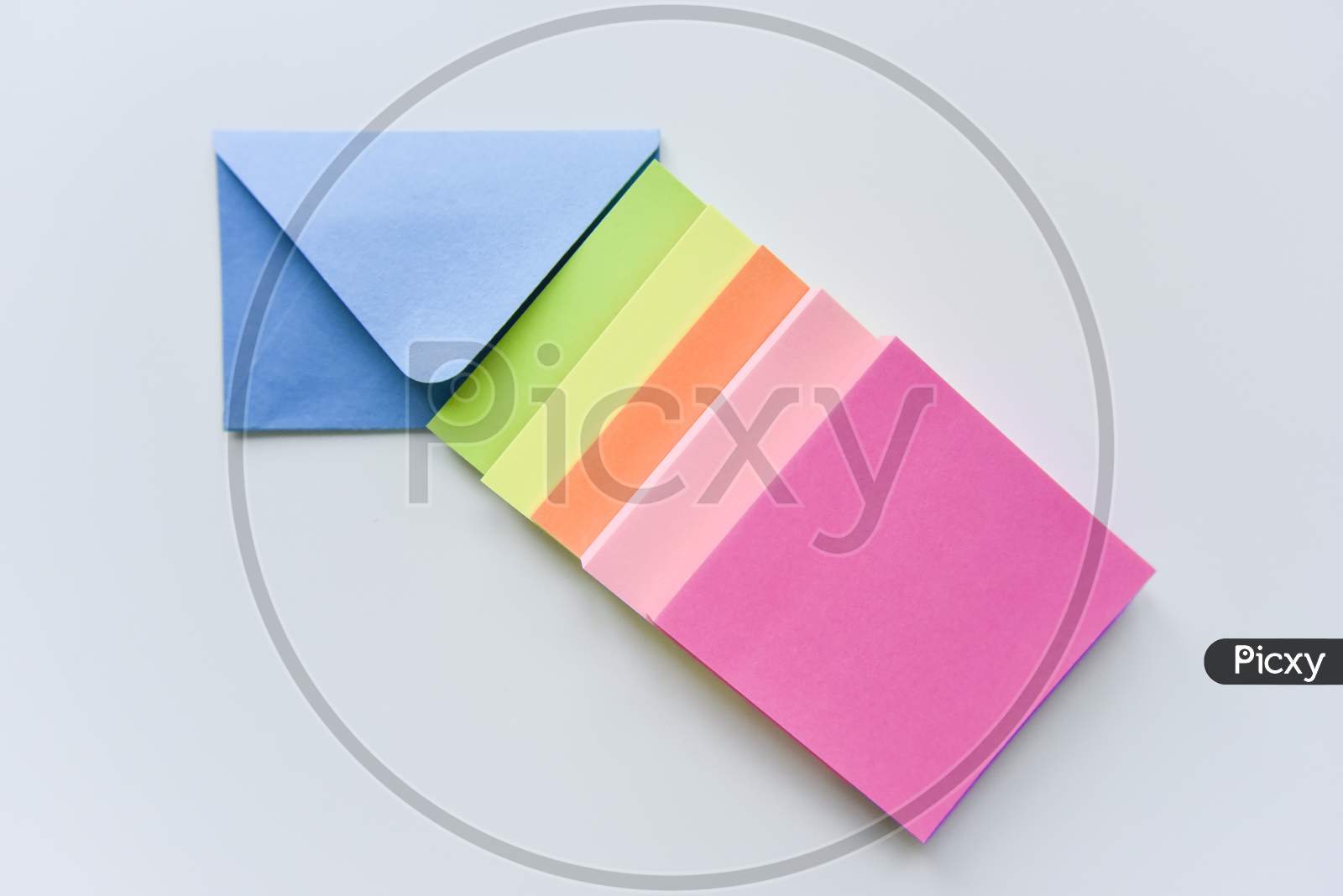 Selective Focus, Blue Envelope In The Center With Colored Rectangles Directed Towards The Corner