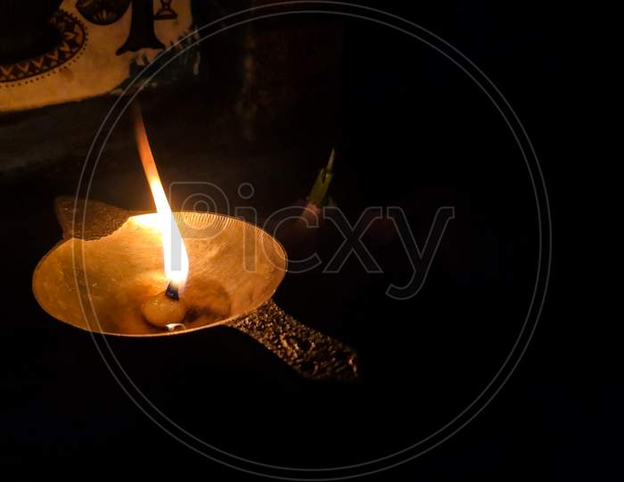 Selective Focus On Burning Oil Lamp On Temple