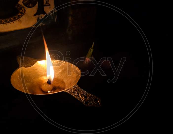 Selective Focus On Burning Oil Lamp On Temple