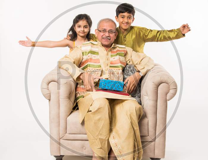 Indian kids and grandparents celebrating festival