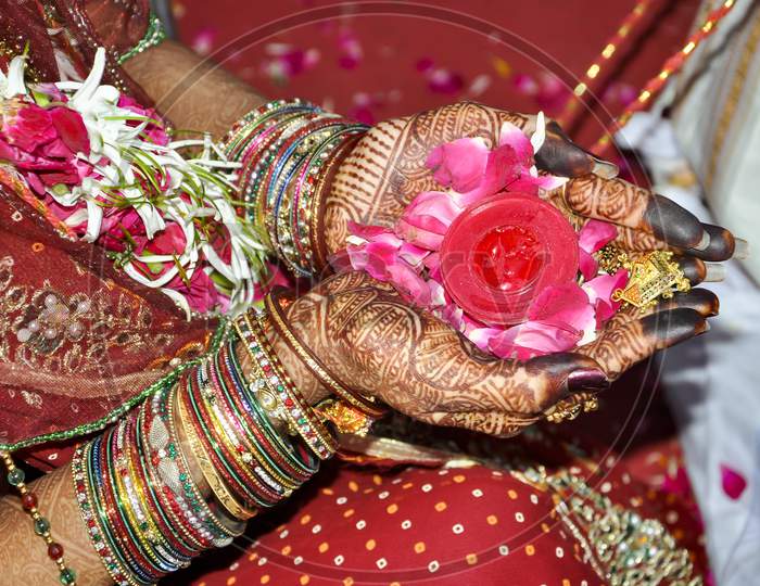 Indian Wedding Rituals With Flower On Hands.