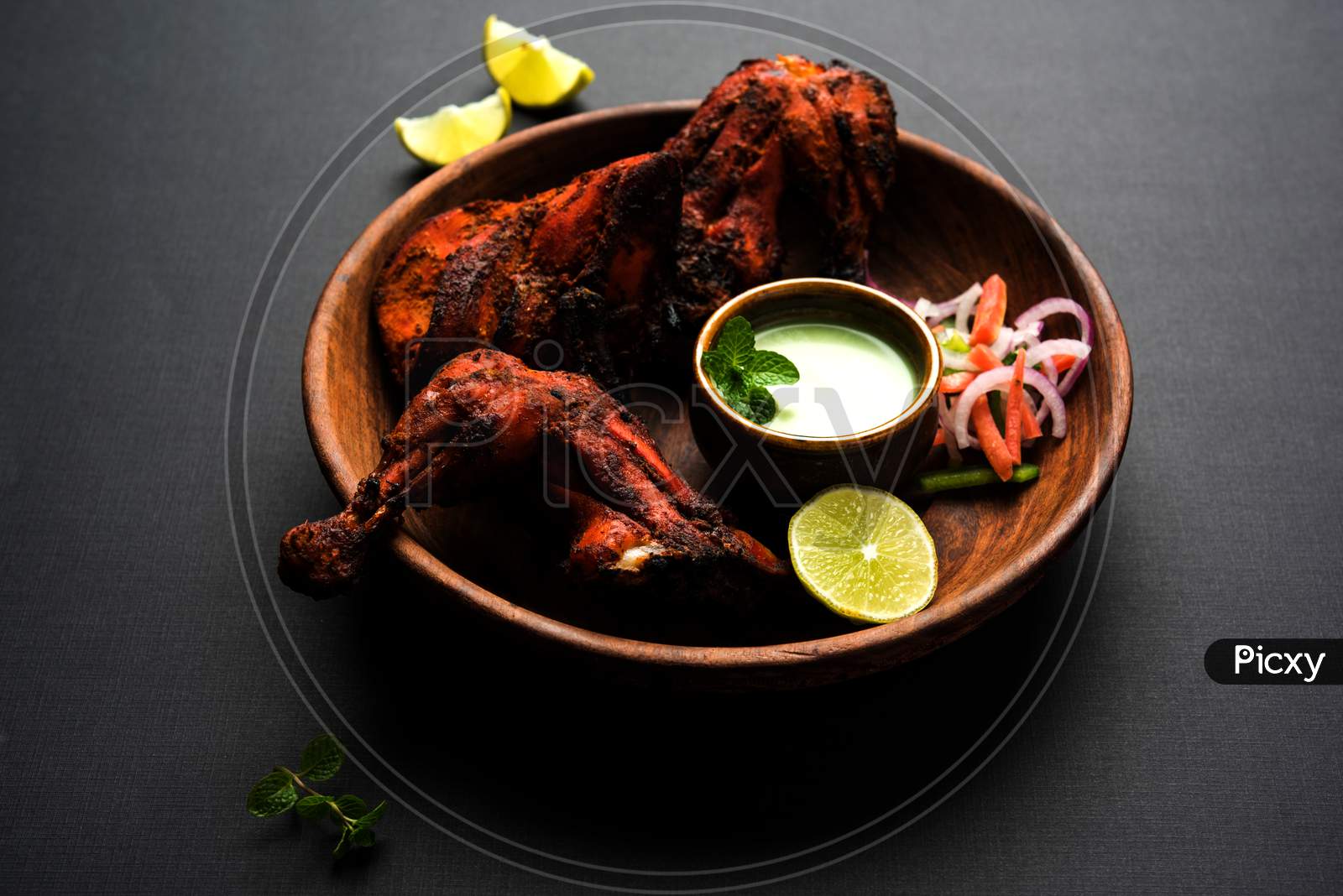 Tandoori chicken or barbecue grilled chicken legs