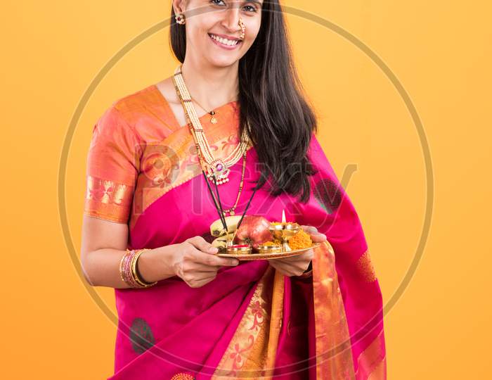 Indian lady with puja thali