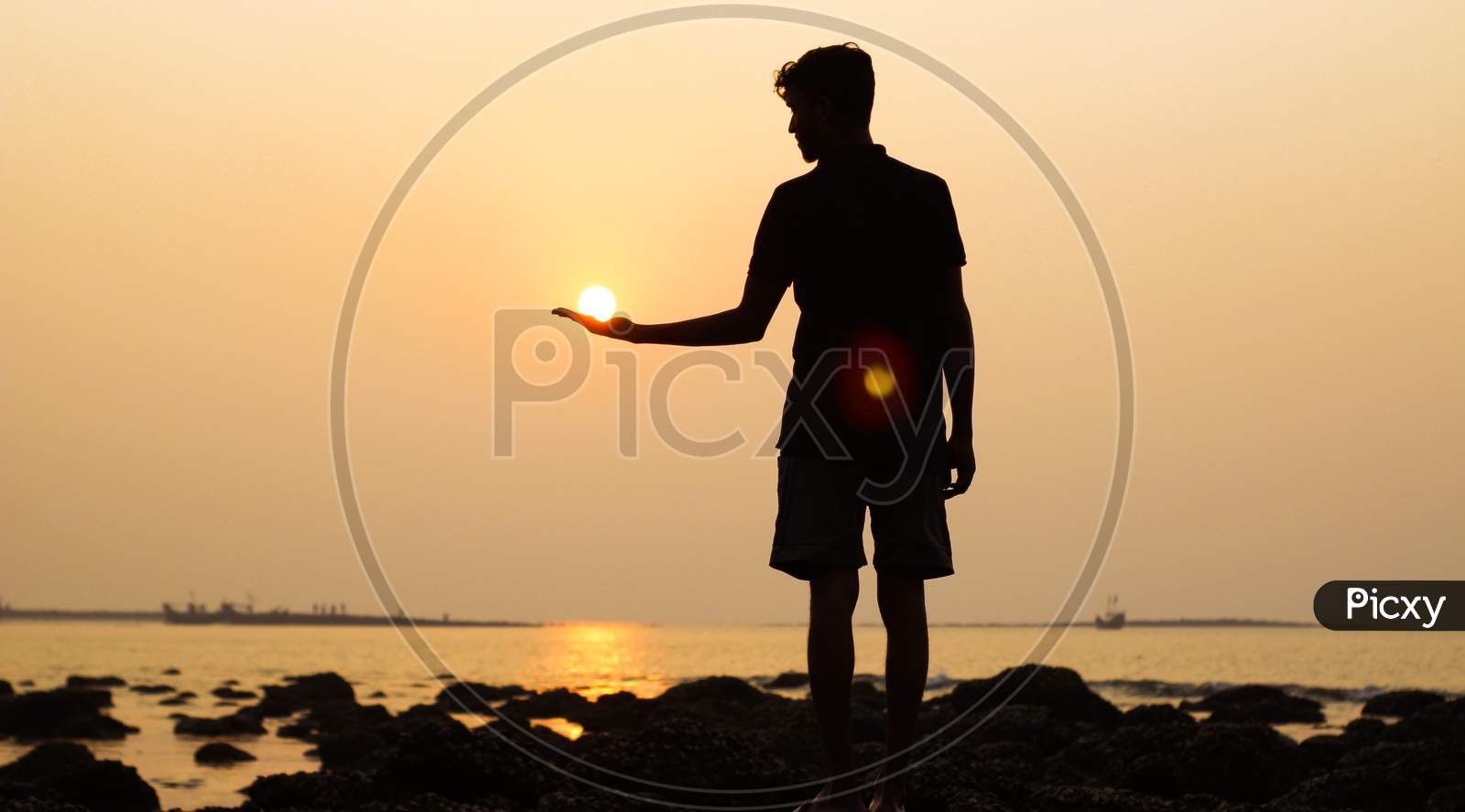 Sun On Boy Hand Sunset Time At Sea Beach .