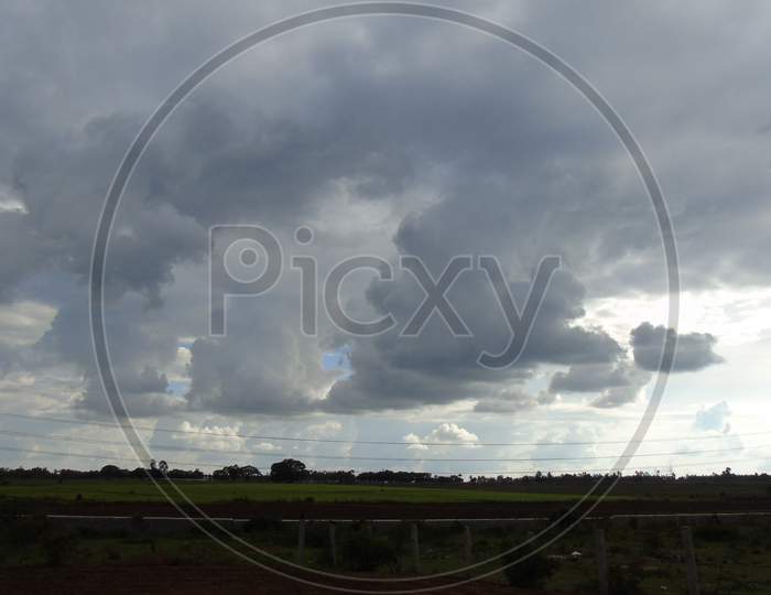 cloudy sky above the  field