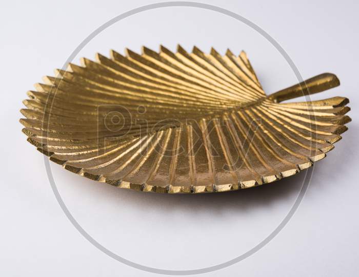 Empty golden designer ceramic plate