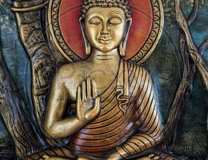 Gautam Buddha Sculpture in golden colour