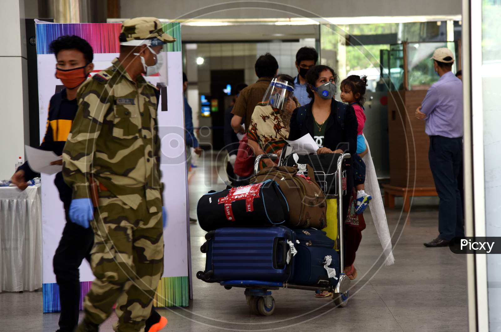 Guwahati,Assam,India-May 25:Passengers, Wearing Mask, Leave From Lokpriya Gopinath Bordoloi International Airport, After Arriving By A Domestic Flight Following Its Resumption, In Guwahati,Assam,India, Monday, May 25, 2020.