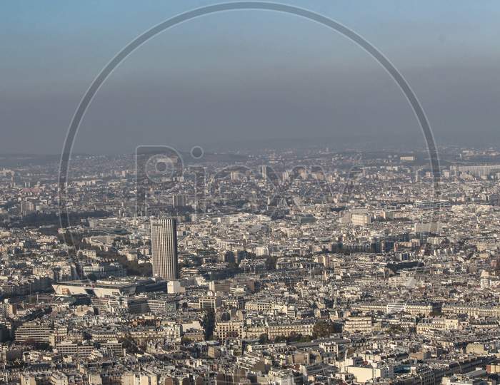 Top View Of Paris City From Eiffel Tower.