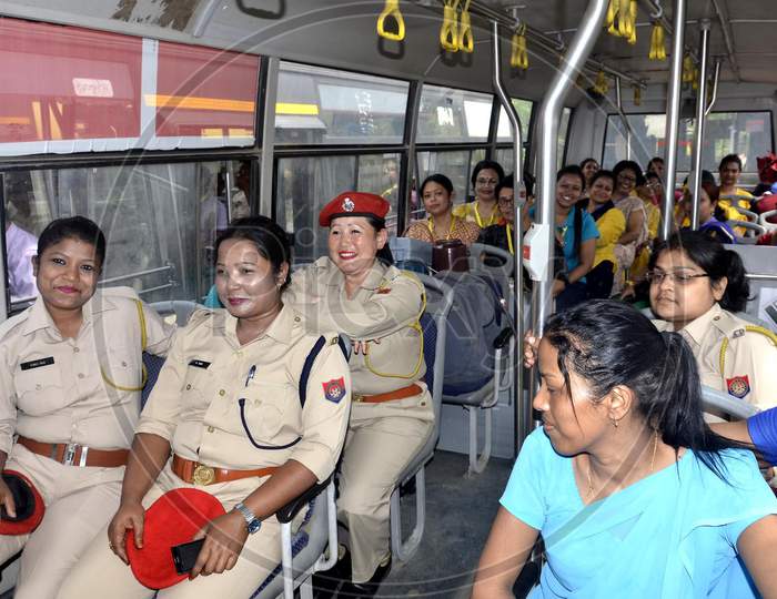 Women Police and  Polling officials sitting on Bus to leave their respective polling stations