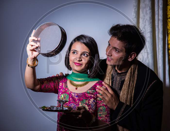 couple celebrating karwa chauth festival