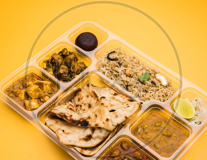 Indian vegetarian thali or food platter for parcel