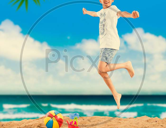 Kid with grand parents playing at beach