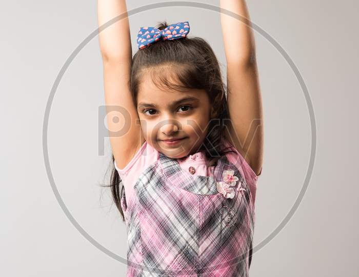 Portrait of Cute little girl isolated over white background