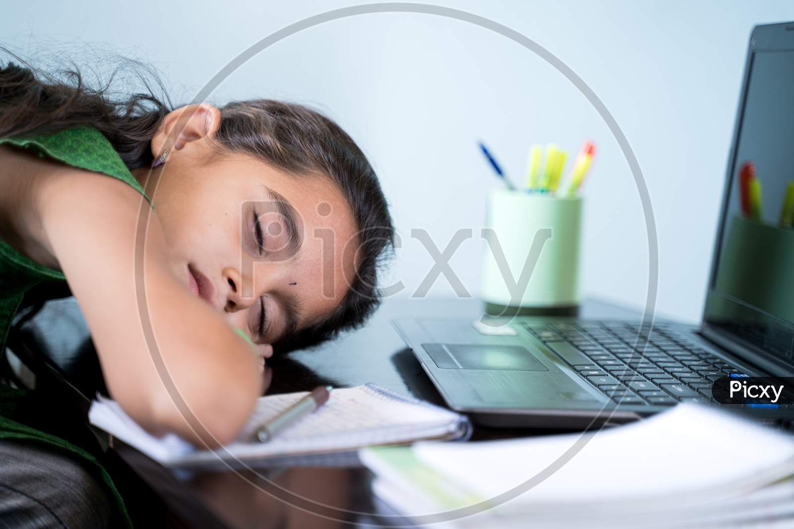 Bored Girl Child Slept Infront Of Laptop - Concept Of Kid Tired From E-Learning Or Online Education At Home During Covid-19 Or Coronavirus Outbreak.
