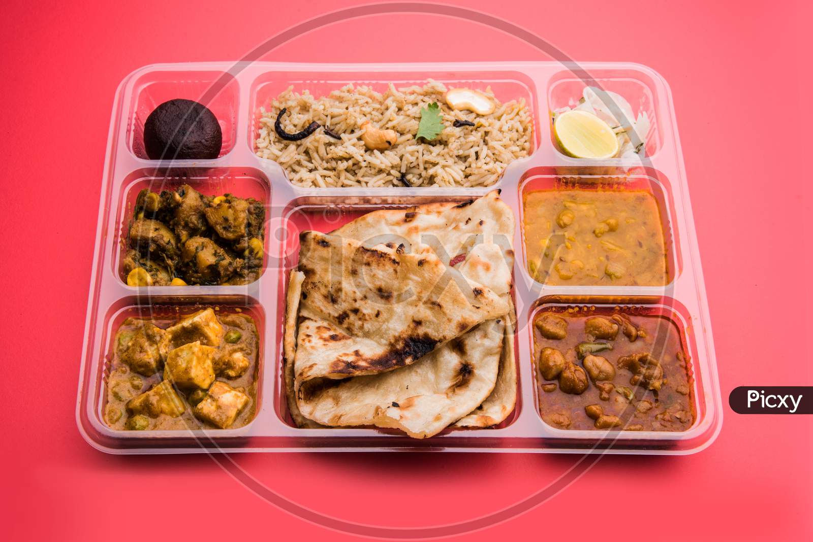 Indian vegetarian thali or food platter for parcel