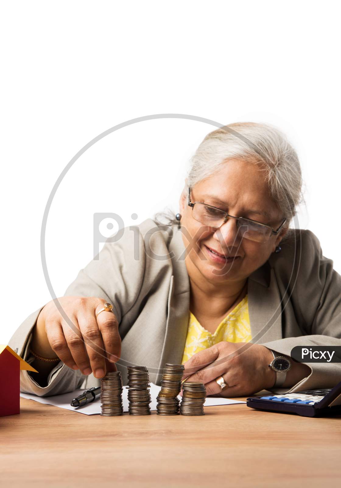 Senior woman with money/coins - saving concept