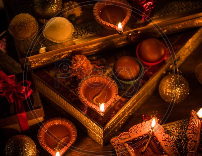 Diwali diya or lighting in the night with gifts