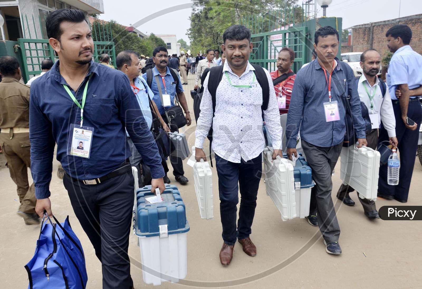Polling officials leave after collecting Electronic Voting Machines (EVM)
